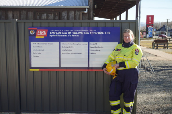 Tania in uniform (Dredge NZ) ERP board Omarama